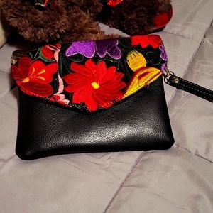 clutch with an attachable strap brand new no tags purchased in Mexico